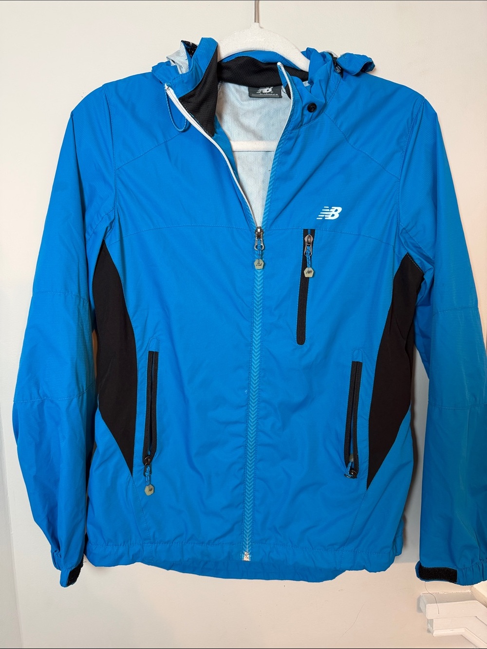 New Balance Bright Blue Hooded Womens Windbreaker with Black Panels. Small